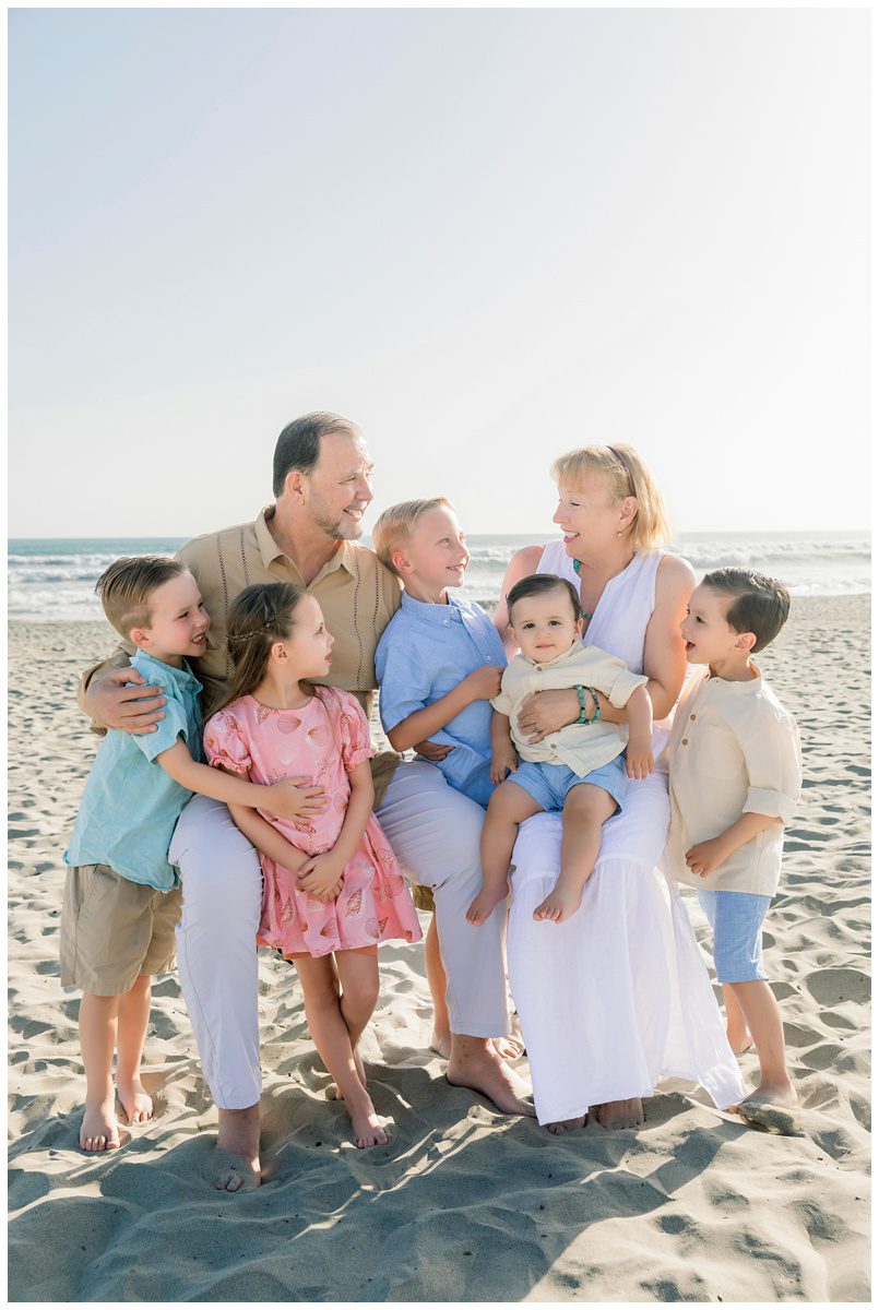 Grandparents with their grandchildren, Extended family portraits on family vacation in Oceanside California