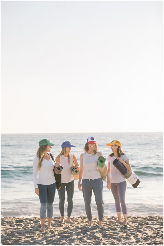 Friends going to a yoga class on the beach