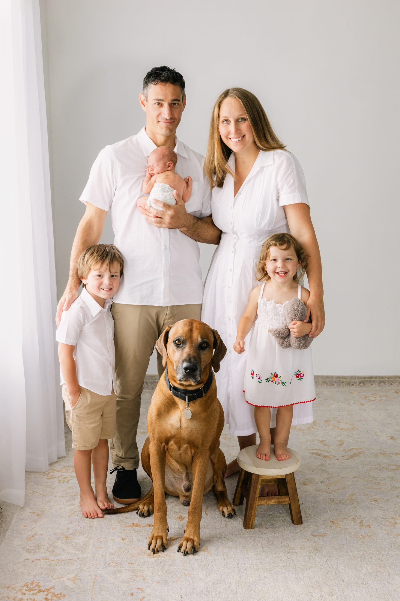 Family of five with their dog, studio family portrait in Carlsbad
